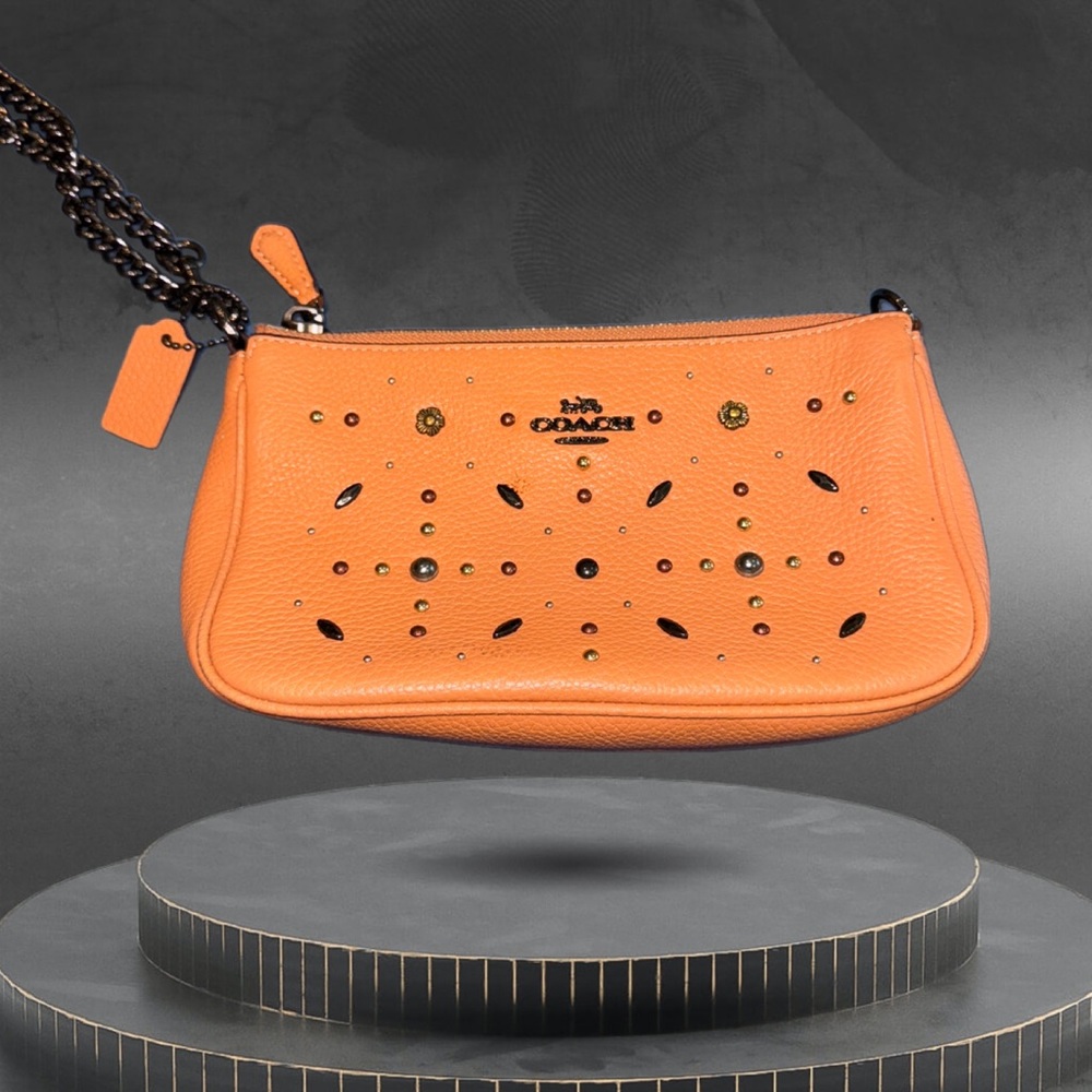 EUC Coach Authentic Small Nolita Wristlet 19
With Prairie Rivets